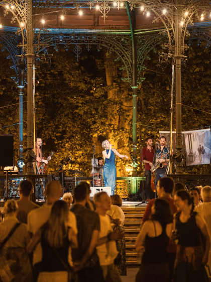 The bandstand at Zrinjevac at night, audience and fairy lights